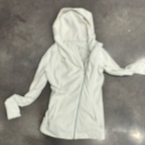 Ivory colored lululemon zip up hooded jacket